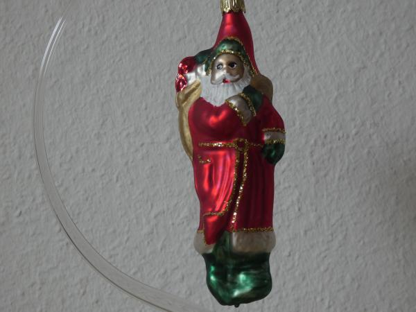 Weihnachtsmann mit Rucksack